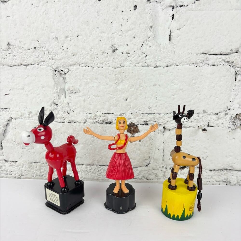 Thumb Puppets Hula Girl, Donkey, and Giraffe.